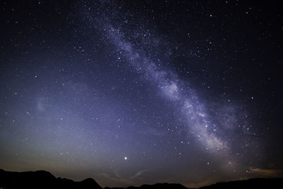 Low angle view of stars in sky at night