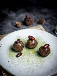 Close-up of food in plate on place mat