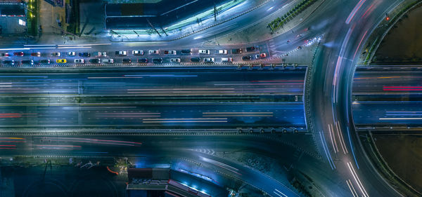 Car traffic transportation above circle roundabout road in asian city.