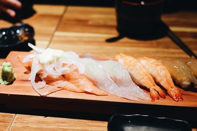 Close-up of sushi served on table