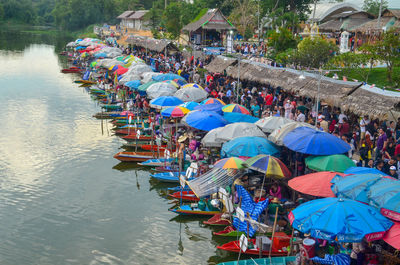 High angle view of people in lake during rainy season