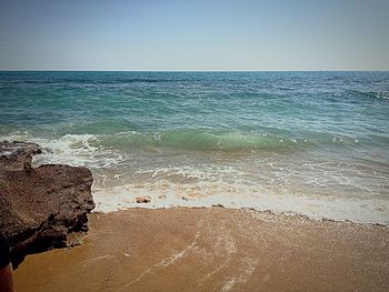 Close-up of sea against clear sky