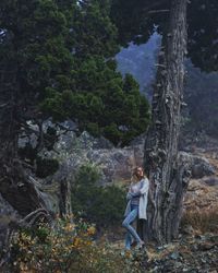 Full length of a man on tree