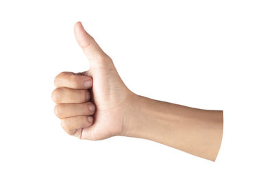 Close-up of human hand against white background