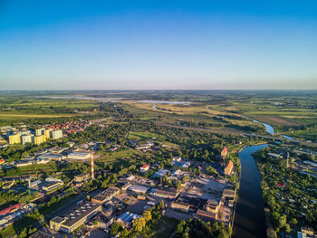 High angle view of buildings in city against clear sky