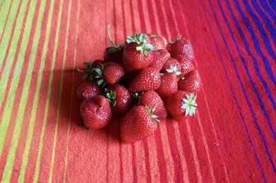 High angle view of strawberries on table