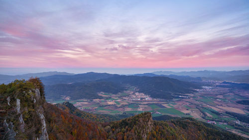 Scenic view of landscape against sky during sunset