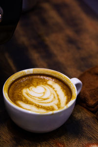 High angle view of cappuccino on table