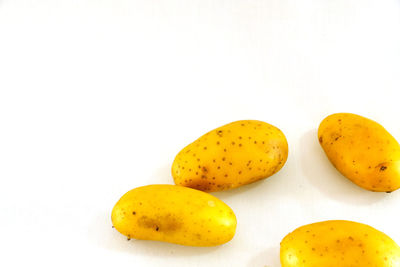 Close-up of fruits against white background