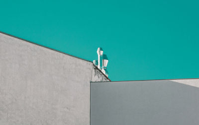 Woman in bikini against blue sky