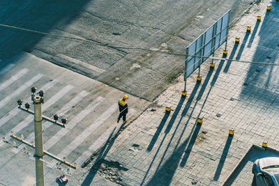 High angle view of man working on bridge