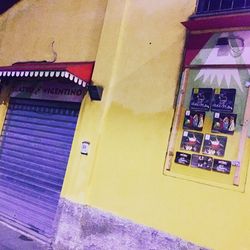 Close-up of lamp hanging on wall