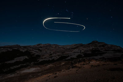 Low angle view of moon against sky at night