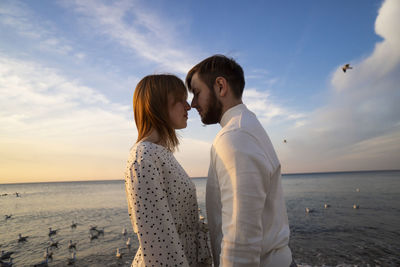 Kaliningrad, russia. young couple in love on the seaside