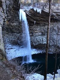 Scenic view of frozen waterfall