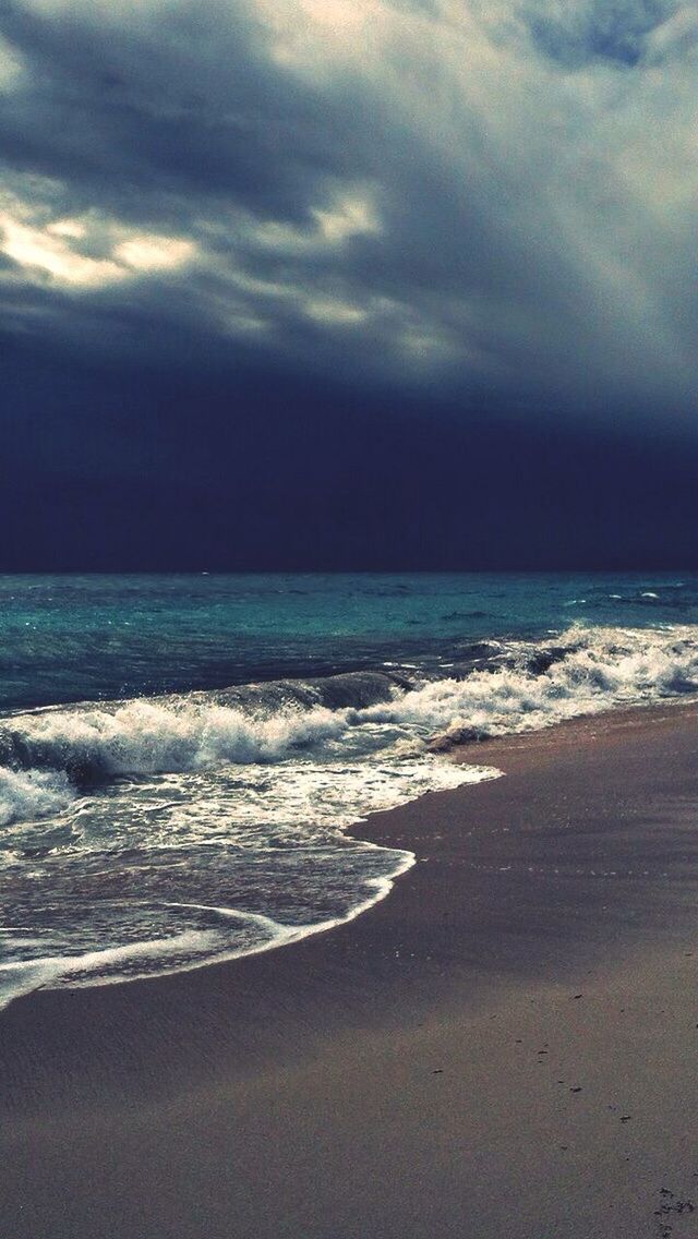 sea, beach, horizon over water, water, sky, shore, wave, scenics, beauty in nature, tranquil scene, sand, surf, tranquility, cloud - sky, nature, cloudy, idyllic, coastline, cloud, remote