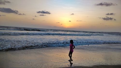 Scenic view of sea at sunset