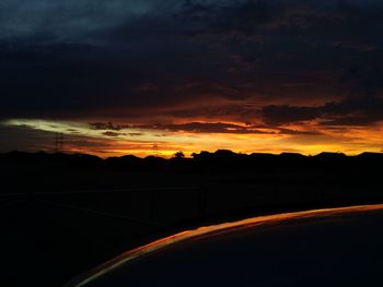 Scenic view of landscape against cloudy sky