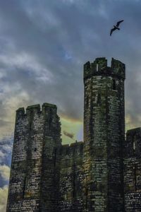 Low angle view of old castle against sky