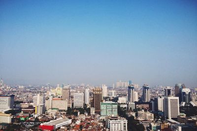 Cityscape against clear sky