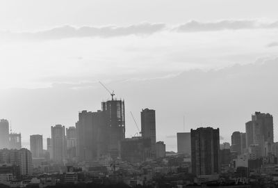 Modern buildings in city against sky