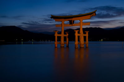 Floating torri gate at sunset