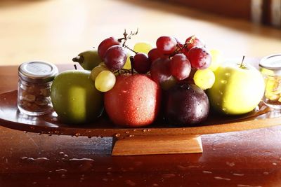 Close-up of fruits in plate on table