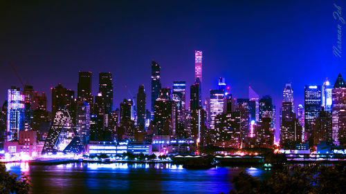 Skyscrapers in city at night