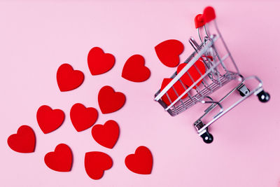 High angle view of red heart shape on table