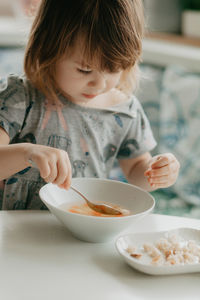 Close-up of boy eating food