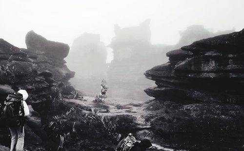 Tourists on cliff