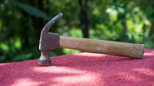 Close-up of rusty metal on table
