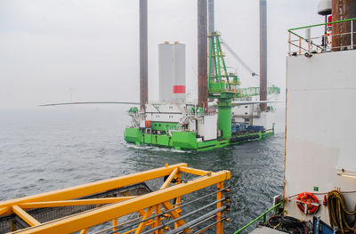 Construction platform in sea during foggy weather