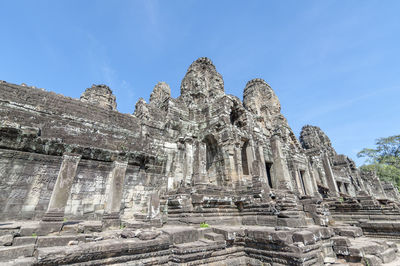 Low angle view of temple against blue sky