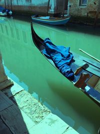 High angle view of boats moored in canal