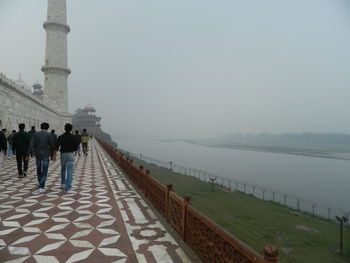 Rear view of people on beach