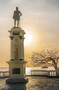 Statue at sunset