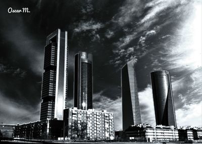 Modern buildings against sky in city