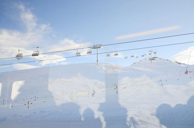 Cable cabins delivering tourists to the top of the matterhorn mountain in zermatt, switzerland.