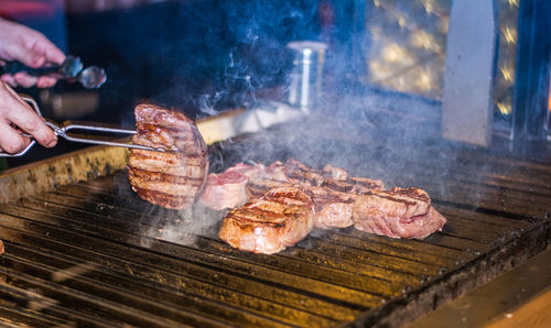 Close-up of meat on barbecue grill