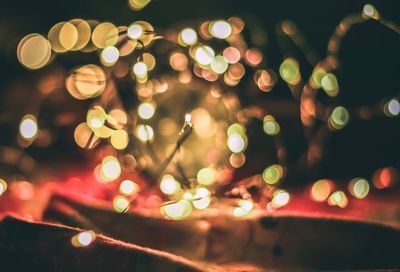 Defocused image of illuminated lights at night