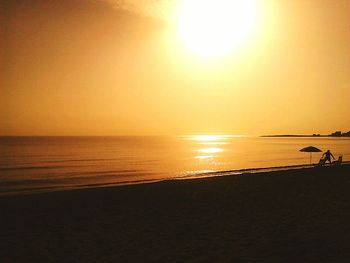 Scenic view of sea at sunset
