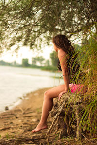 Rear view of woman looking away