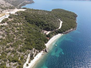 High angle view of bay against clear sky