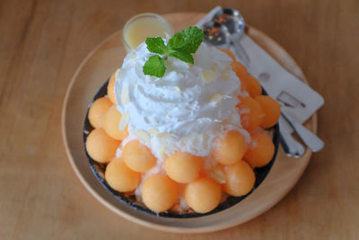 Close-up of ice cream in plate on table