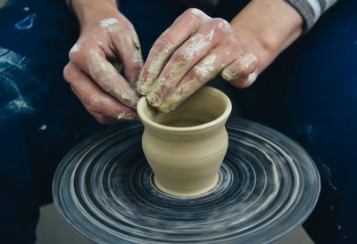 Midsection of person preparing food