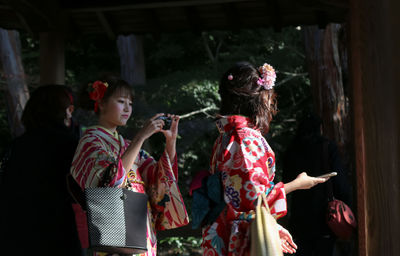 Rear view of women and woman