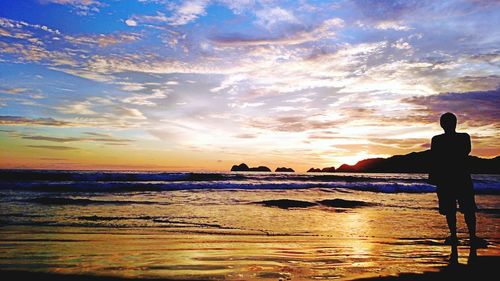 Scenic view of sea at sunset