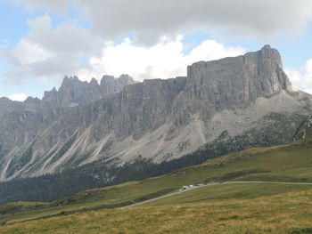 Scenic view of landscape and mountains against sky