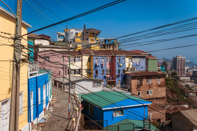 Low angle view of buildings against blue sky